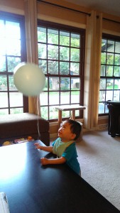 Alexander's first balloon. He carried it around all night!