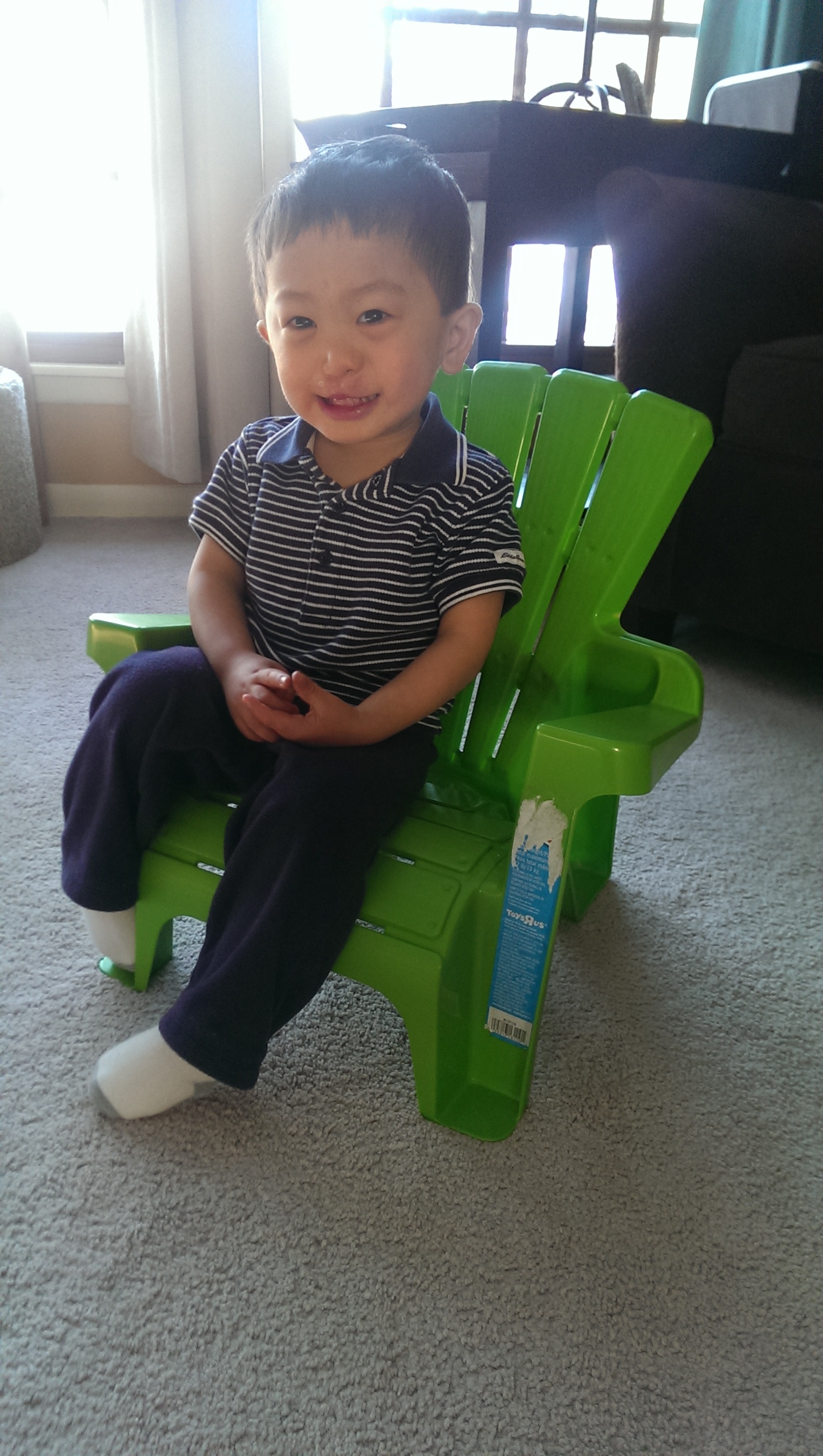 Loving his new Adirondack chair. When we ask him to smile, we say "Say lactose!"